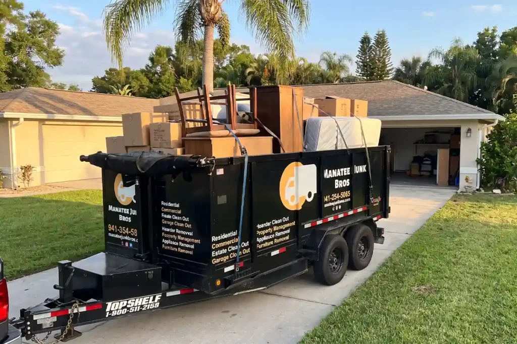 Loaded trailer outside a Bradenton home after a full estate cleanout